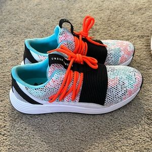Under armour  tennis shoes barely worn.